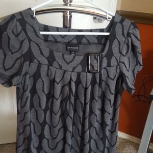 Dress with vertical chainlink design.